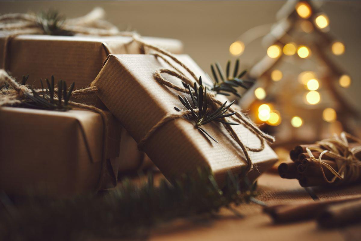 Christmas presents wrapped in natural paper and string