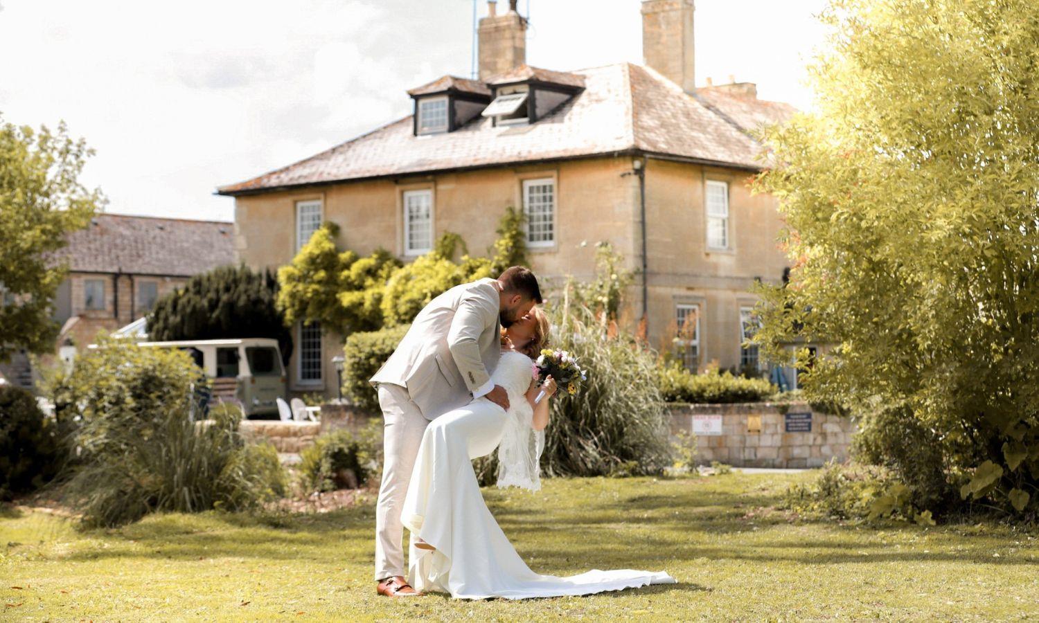 Bride and groom in Widbrook Grange gardens