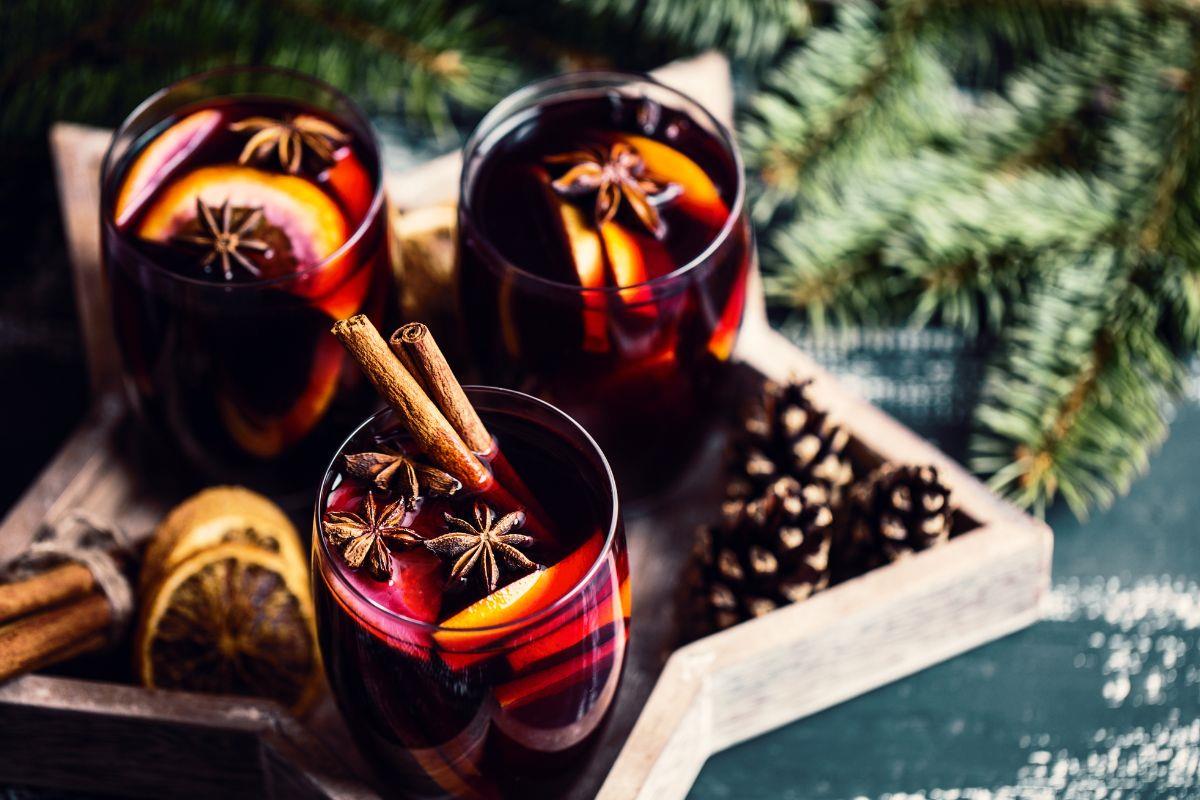 Three glasses of mulled wine on star shaped tray