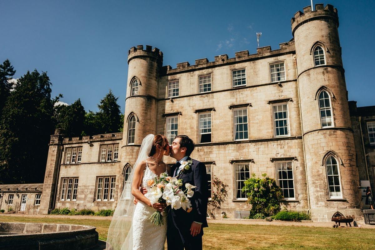 Newly married couple in front of Melville Castle