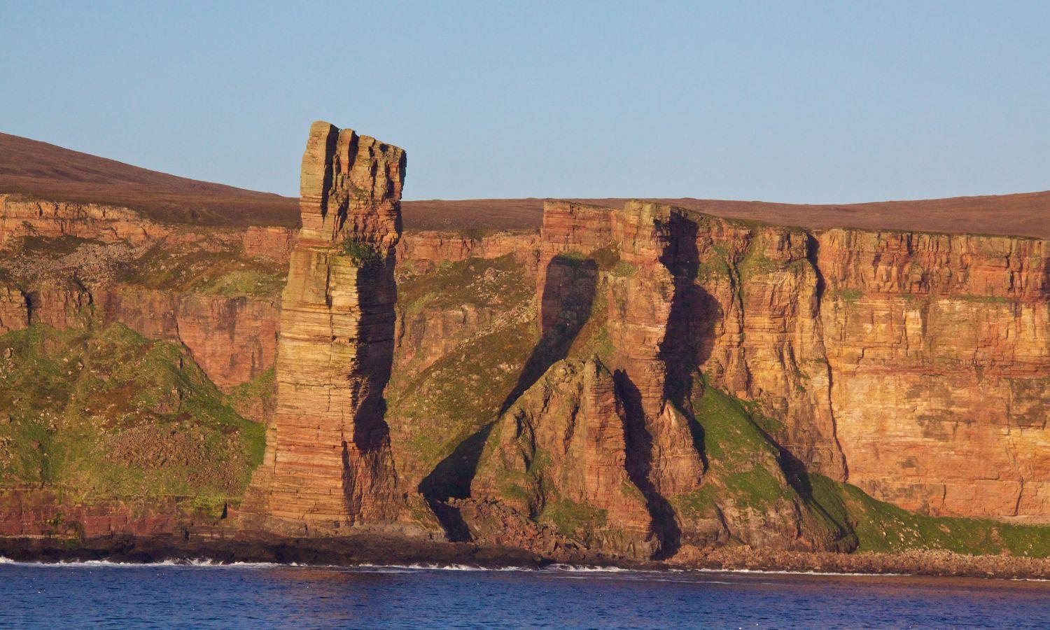 Orkney sea stack and cliffs in evening light 