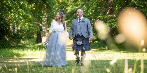 Bride and Groom renewal vows at Melville Castle