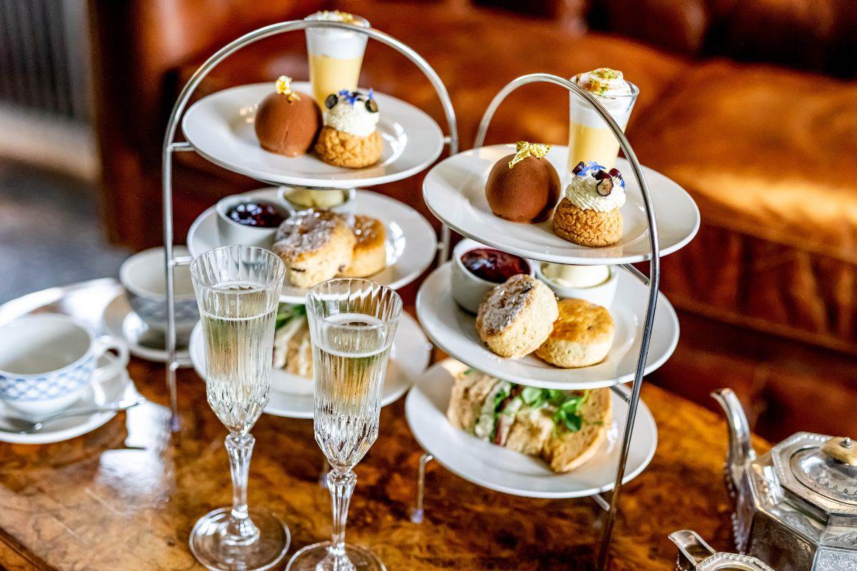 Afternoon tea displayed on tiered plates