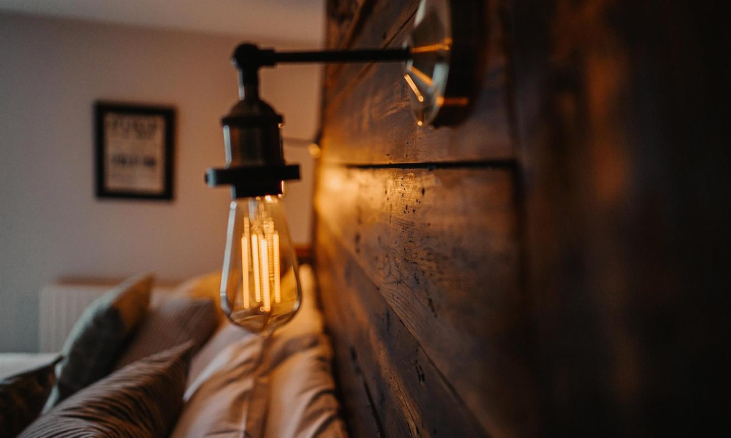 Vintage light on headboard