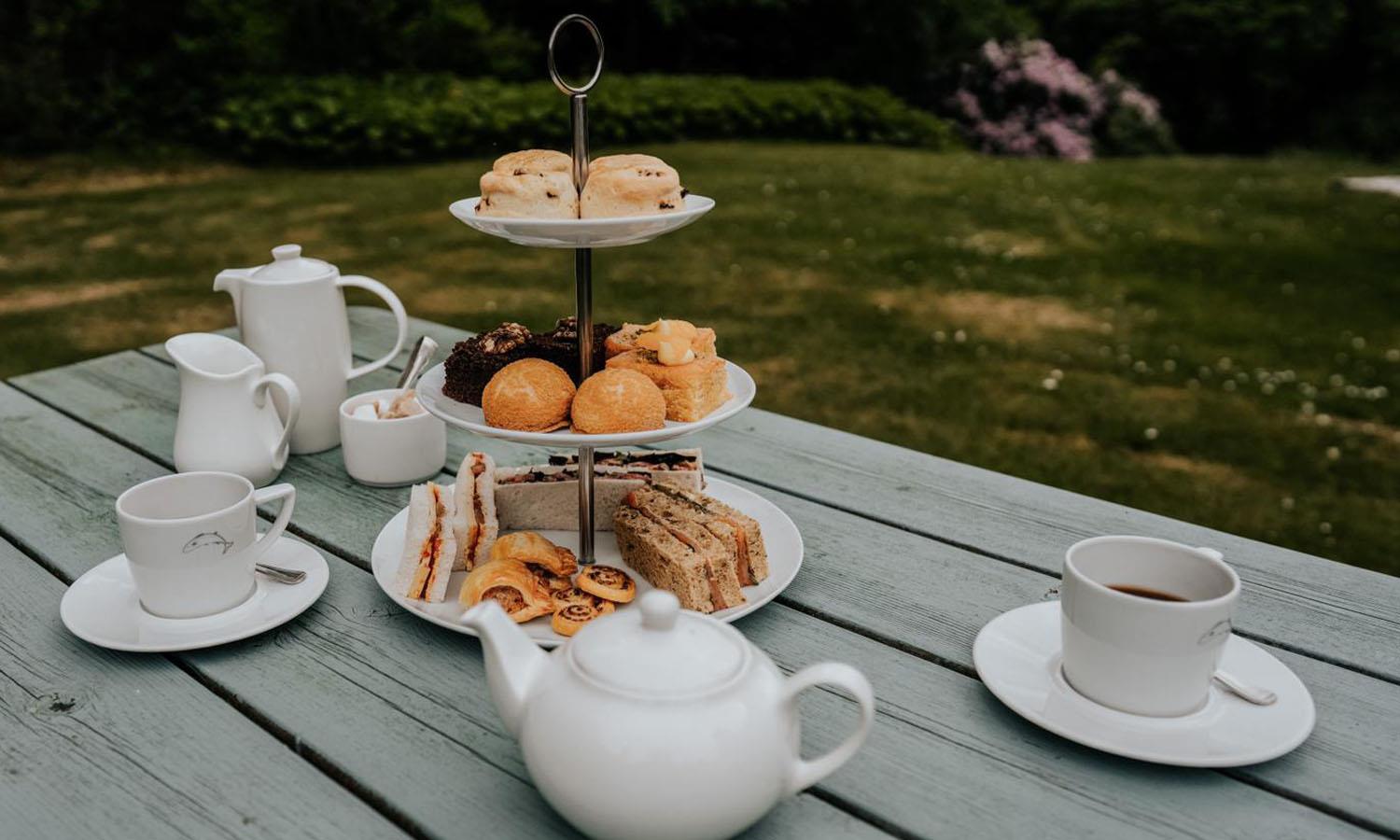 Afternoon Tea on picnic table at Forss House