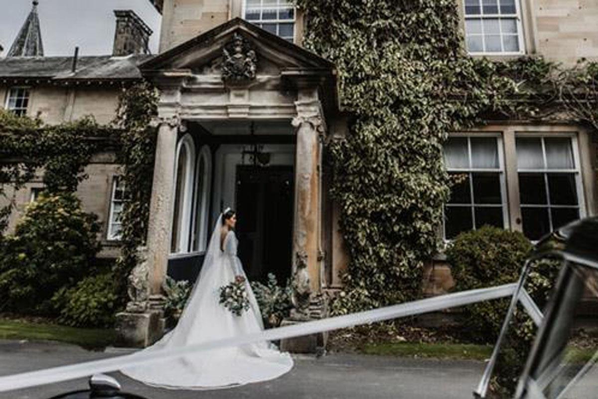 Bride at the entrance to Auchen Castle