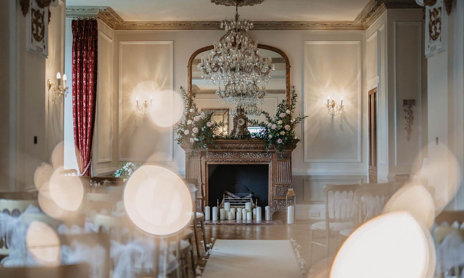 Light-filled ceremony room, styled for an exclusive Scottish castle wedding