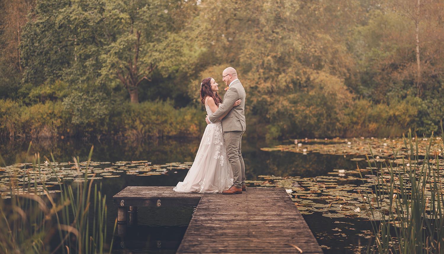 Couple by the water. Photo Credit: Duncan Ireland Photography