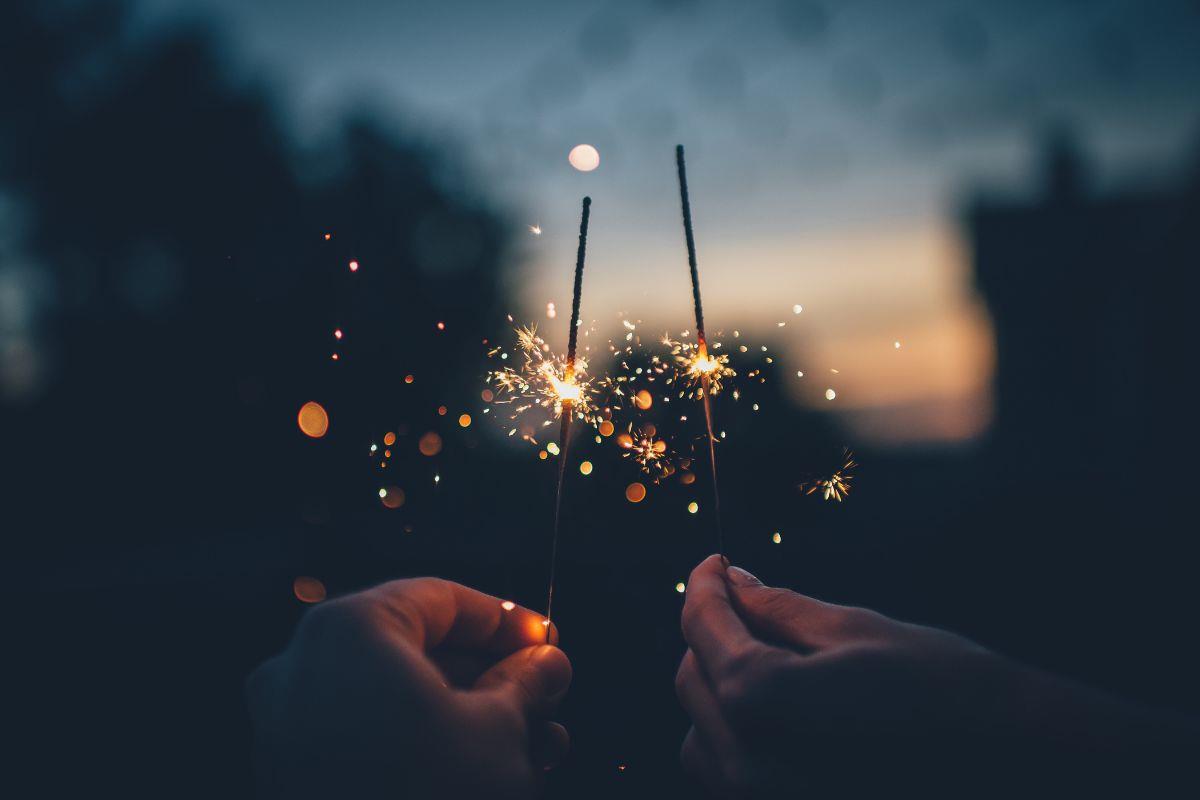 Sparklers lit at dusk