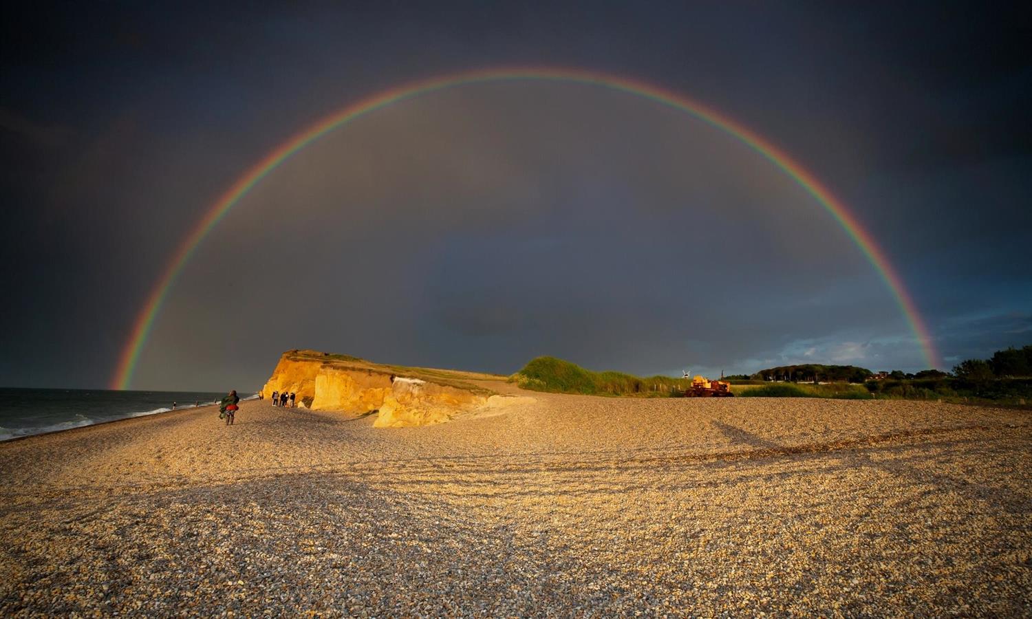 Weybourne Beach in North Norfolk with rainbow