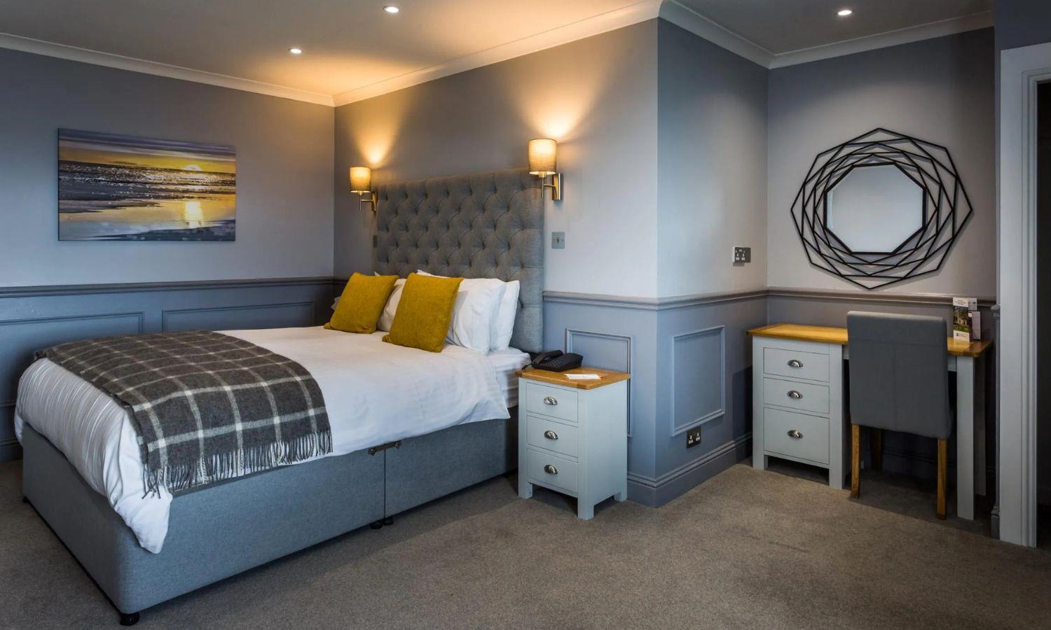Luxury hotel bedroom with double bed