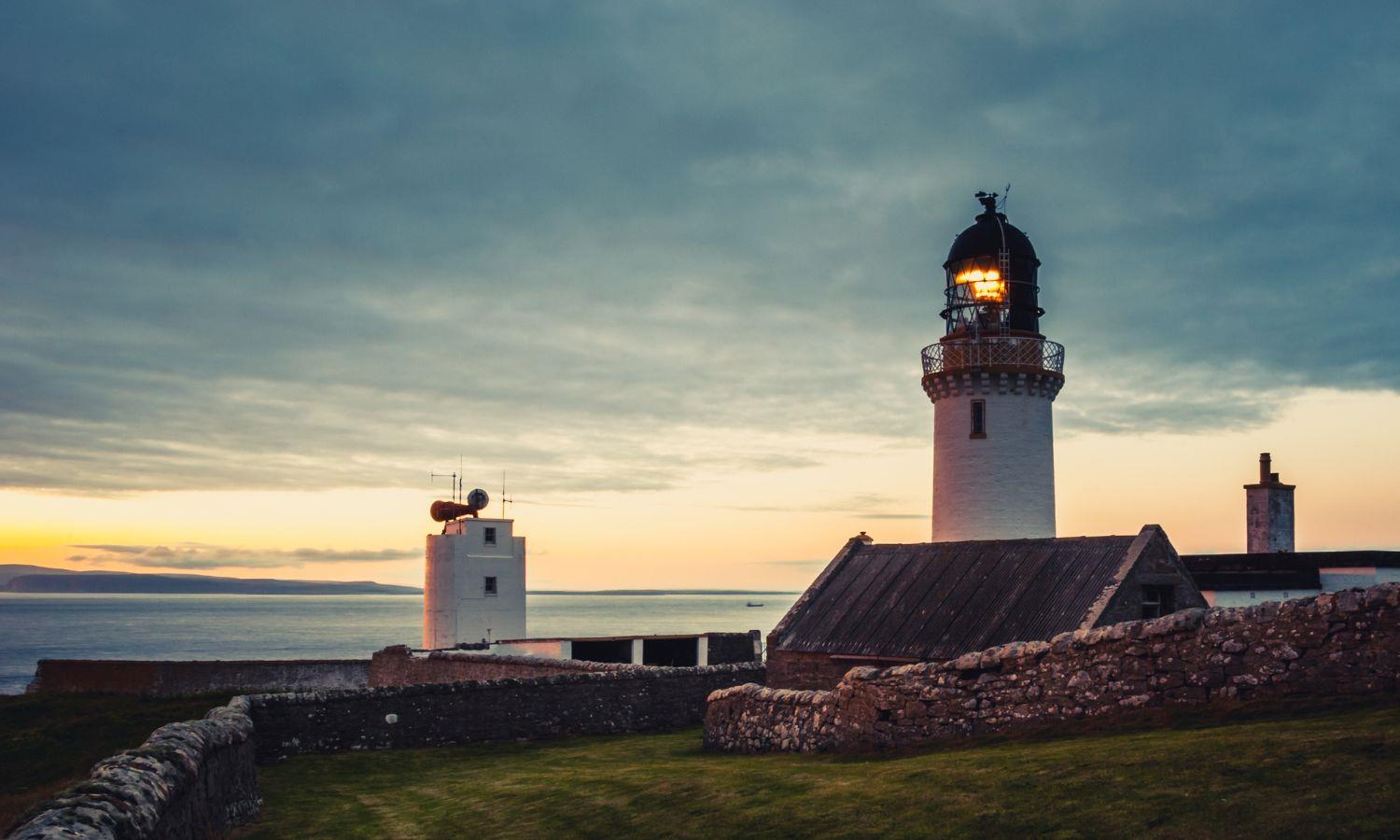 Dunnet head lighthouse in Caithness at dusk