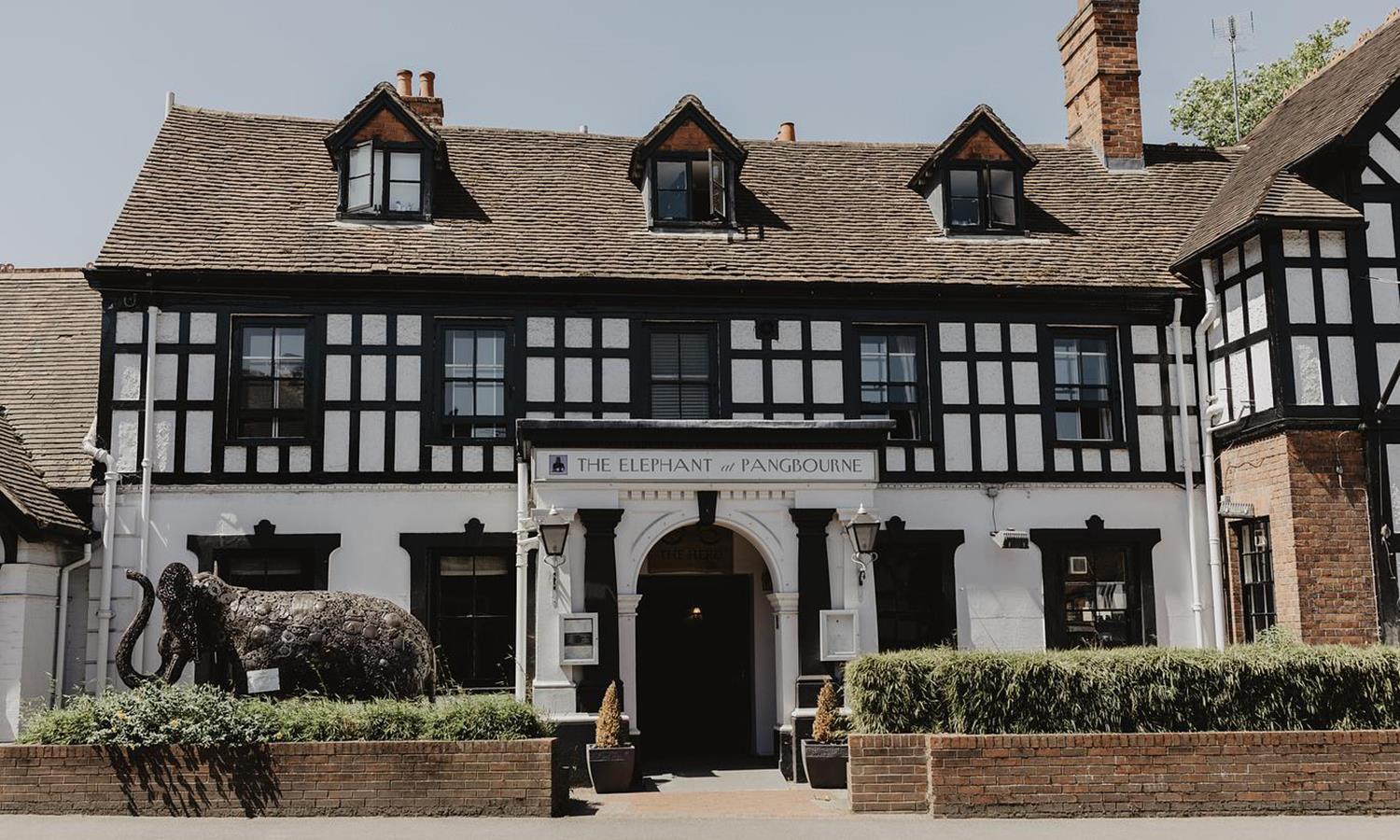 Black and White half timbered front of The Elephant Hotel