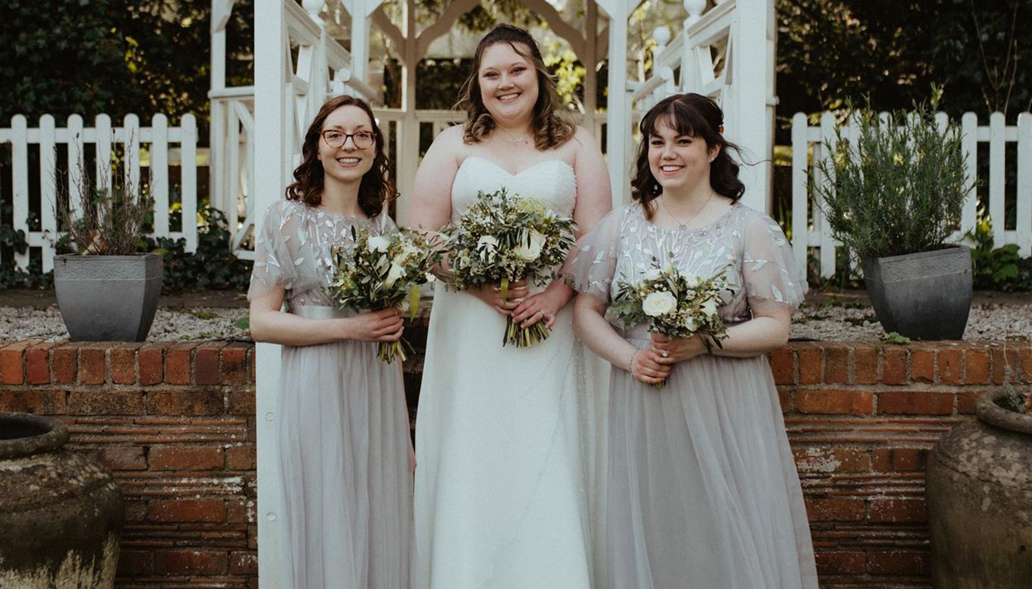 Bride with bridesmaids. Photo Credit: E&O Photography