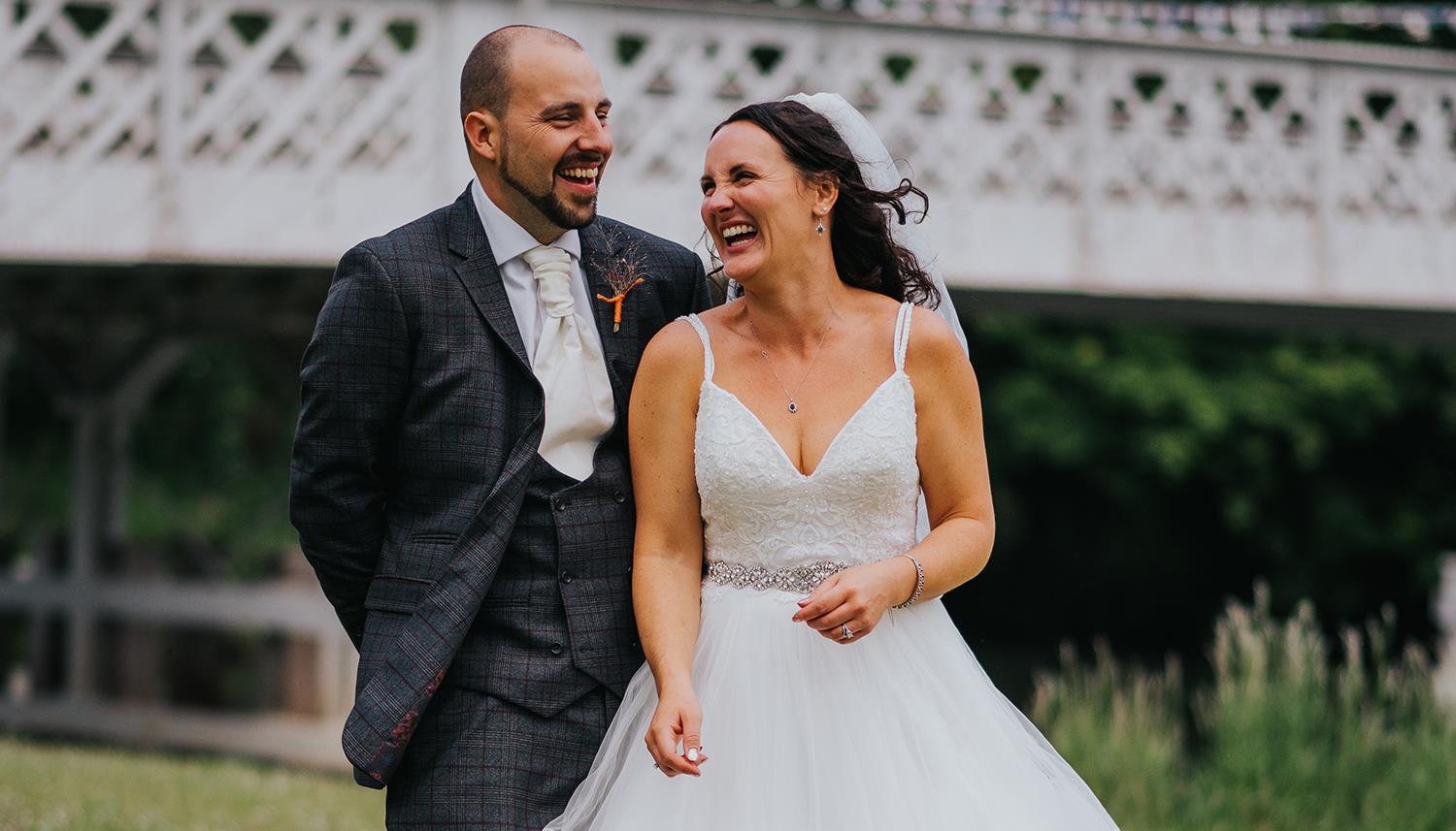 Couple laughing. Photo Credit: Charlie Bluck Photography