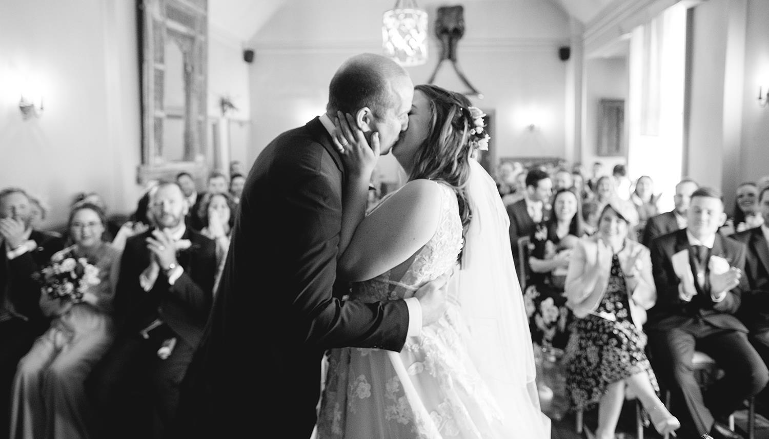 Kissing the bride. Photo Credit: Ilaria Petrucci Photography