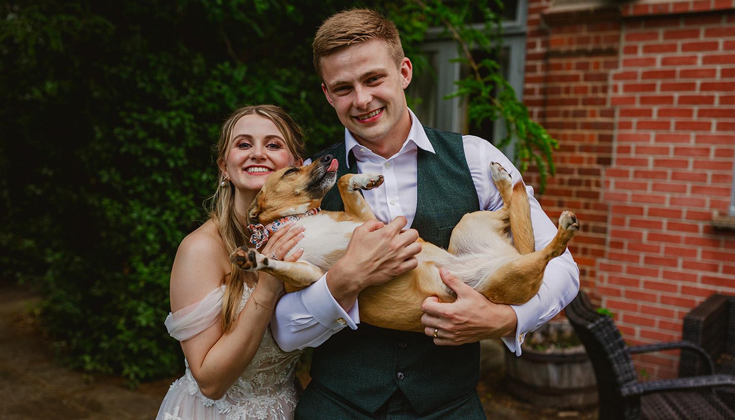 Bride, Groom and dog. Photo Credit: Philip Quinnell Photography