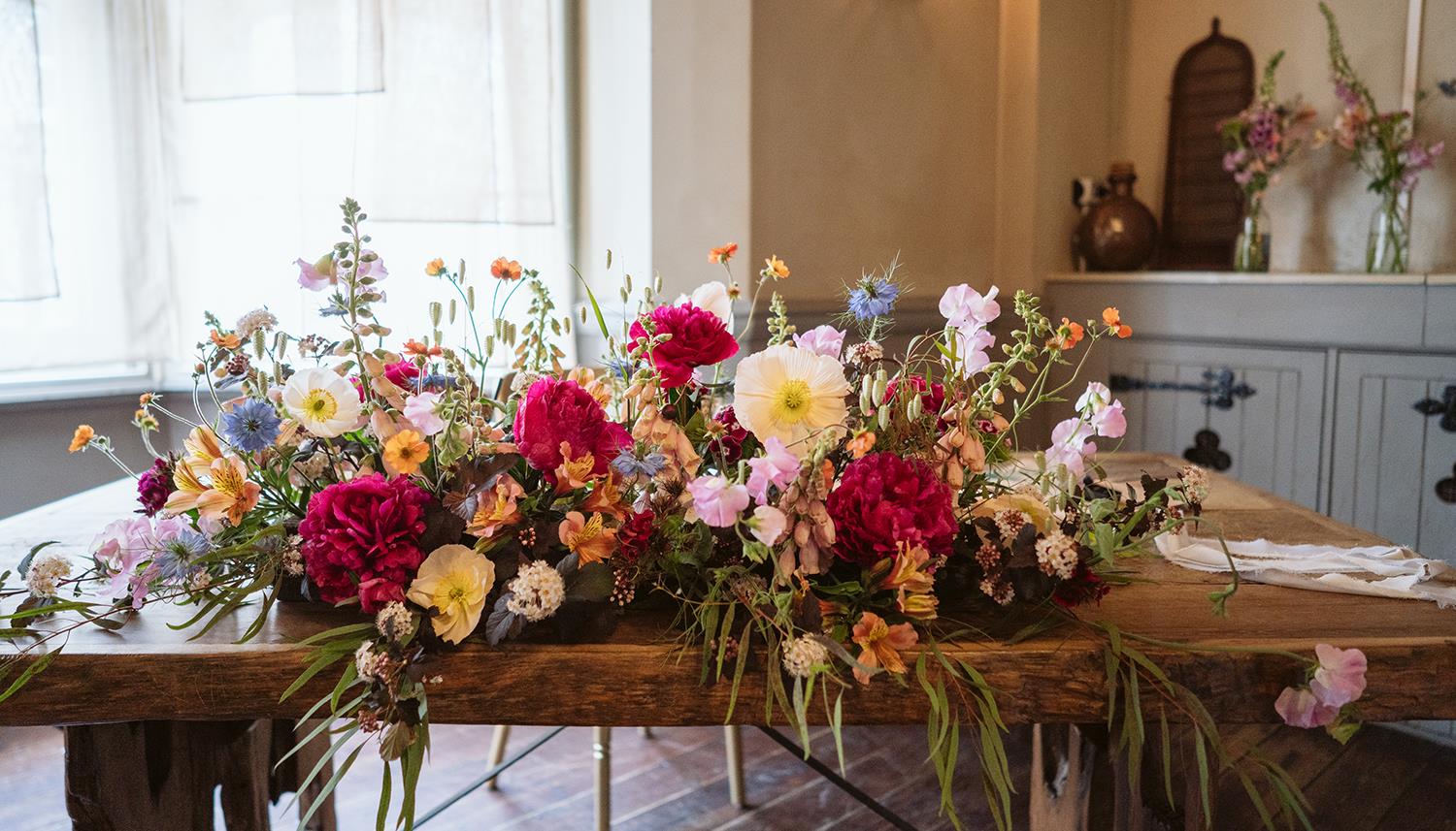 Flowers on table. Photo Credit: Lee Dann Photography