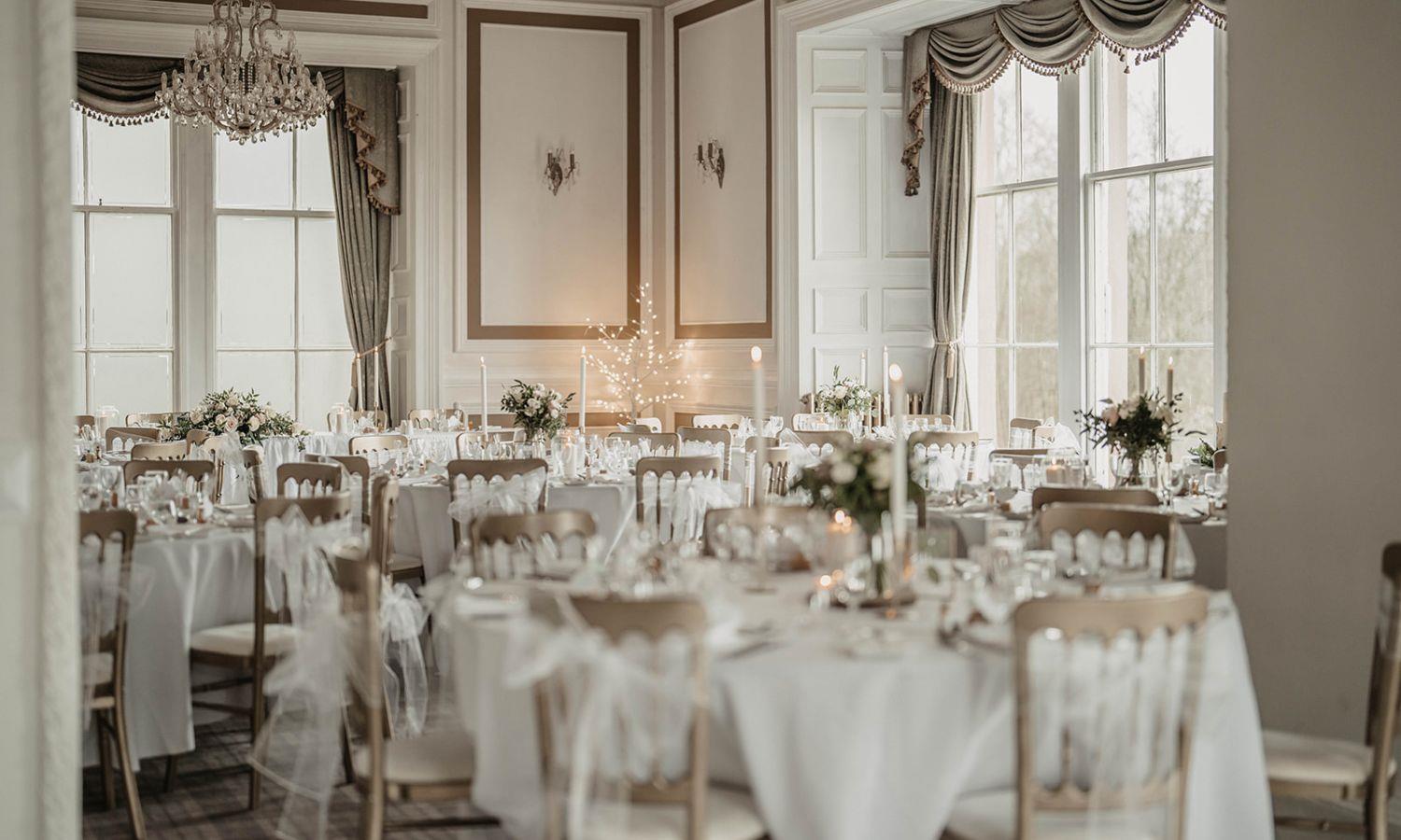 Elegant wedding breakfast set-up at an exclusive-use Scottish castle wedding venue