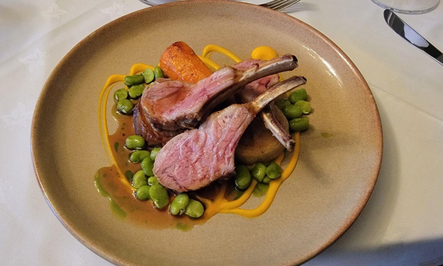 Perfectly cooked lamb in fine dining restaurant setting