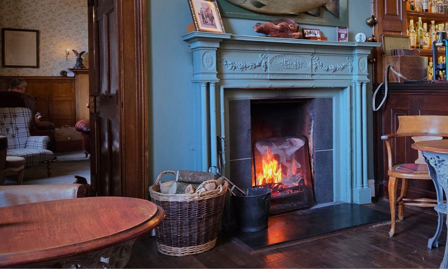 Cosy hotel whisky bar with fire lit