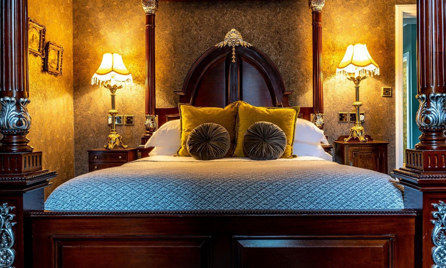Luxury four-poster hotel bedroom 