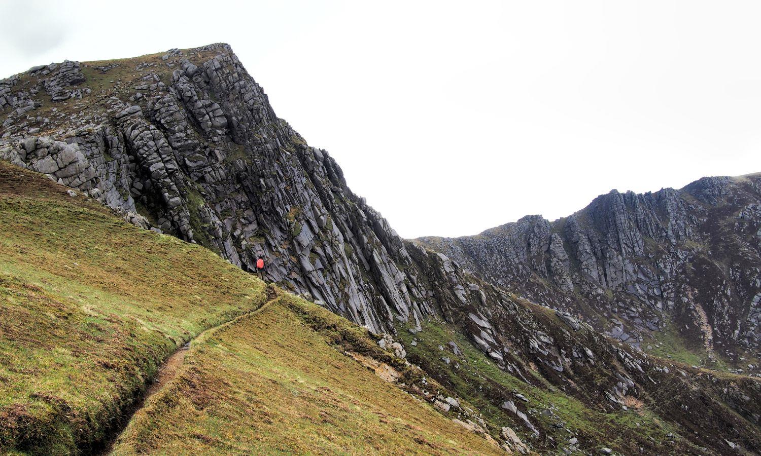 Hiker on mountain ridge on Isle of Arran