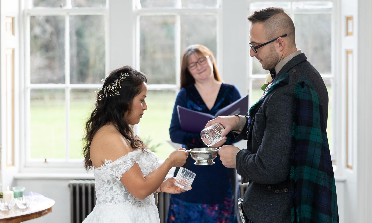 Elopement Bride and groom take their vow with humanist celebrant at Melville Castle
