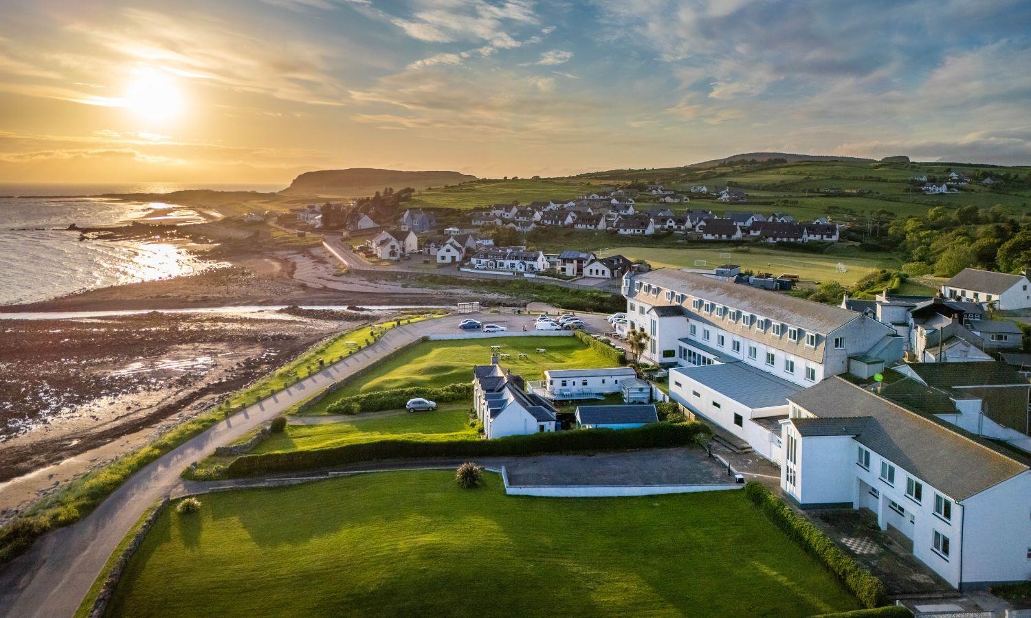 Drone photo of Kinloch Hotel showing beachside setting