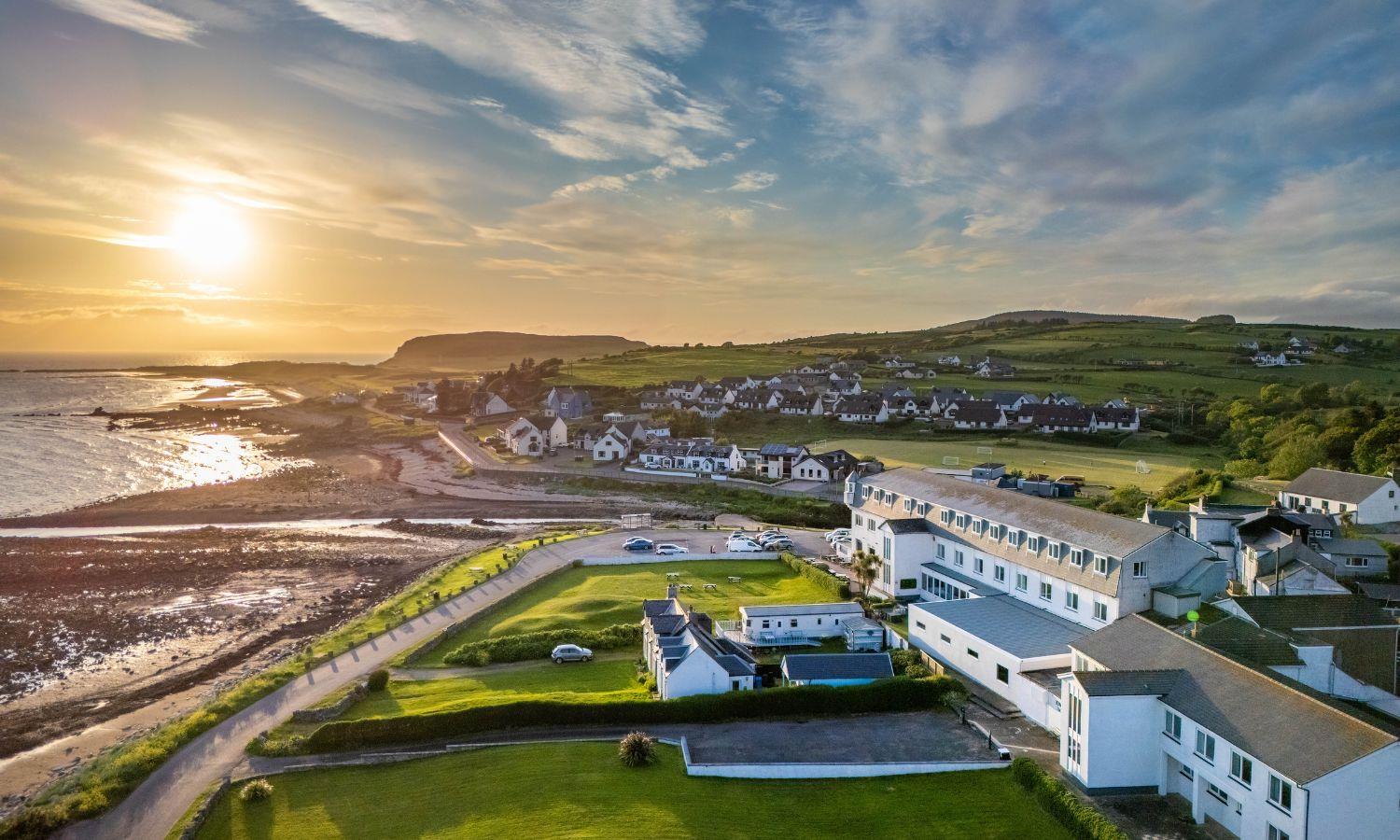 Drone photo of Kinloch Hotel showing beachside setting