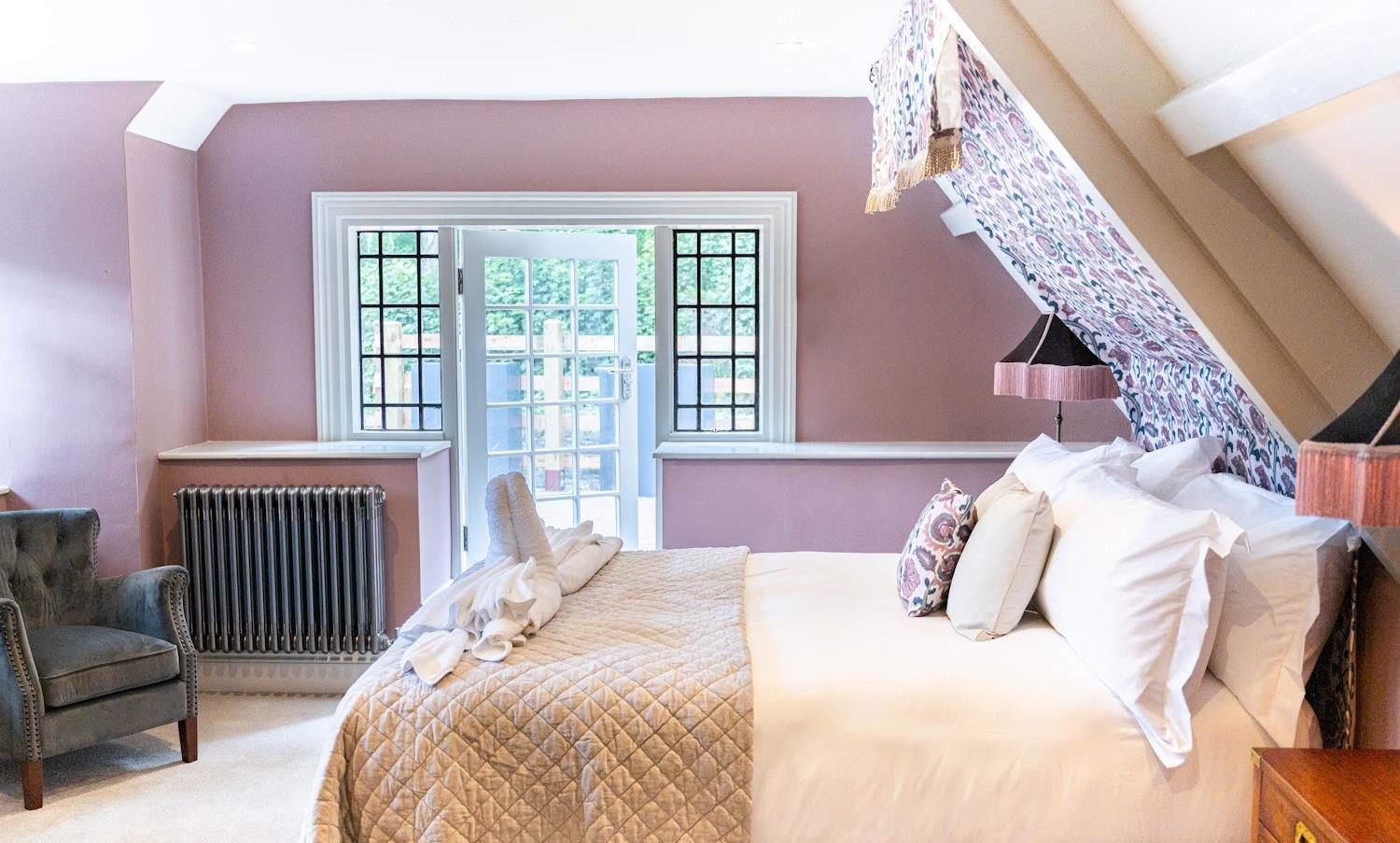 Side view of bedroom Eve, looking out onto towards the terrace