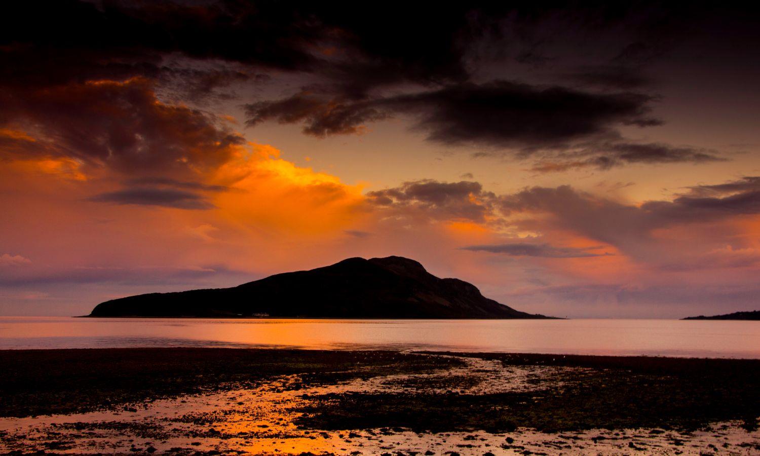Sunset over Lamlash Beach with view to the Holy Island