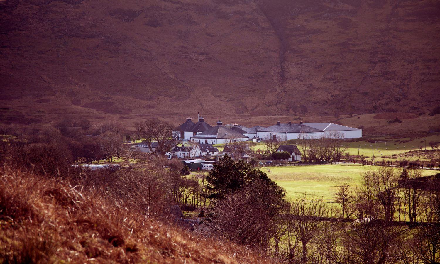Exterior of Lochranza Distillery on Isle of Arran in rugged landscape setting