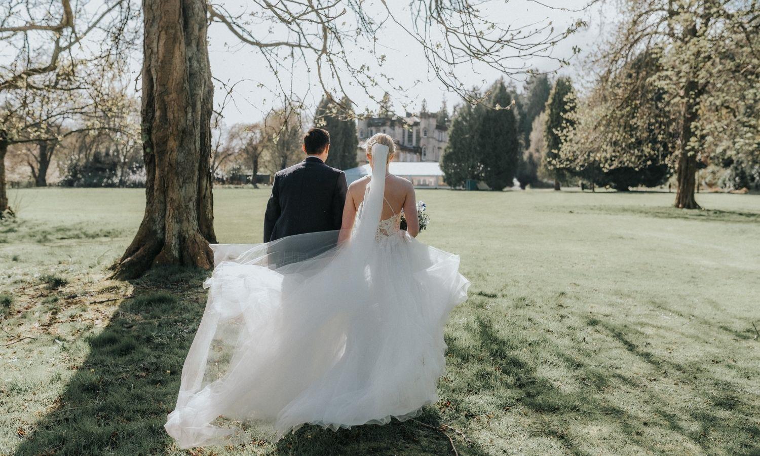 Bride and groom in Melville Castle gardens