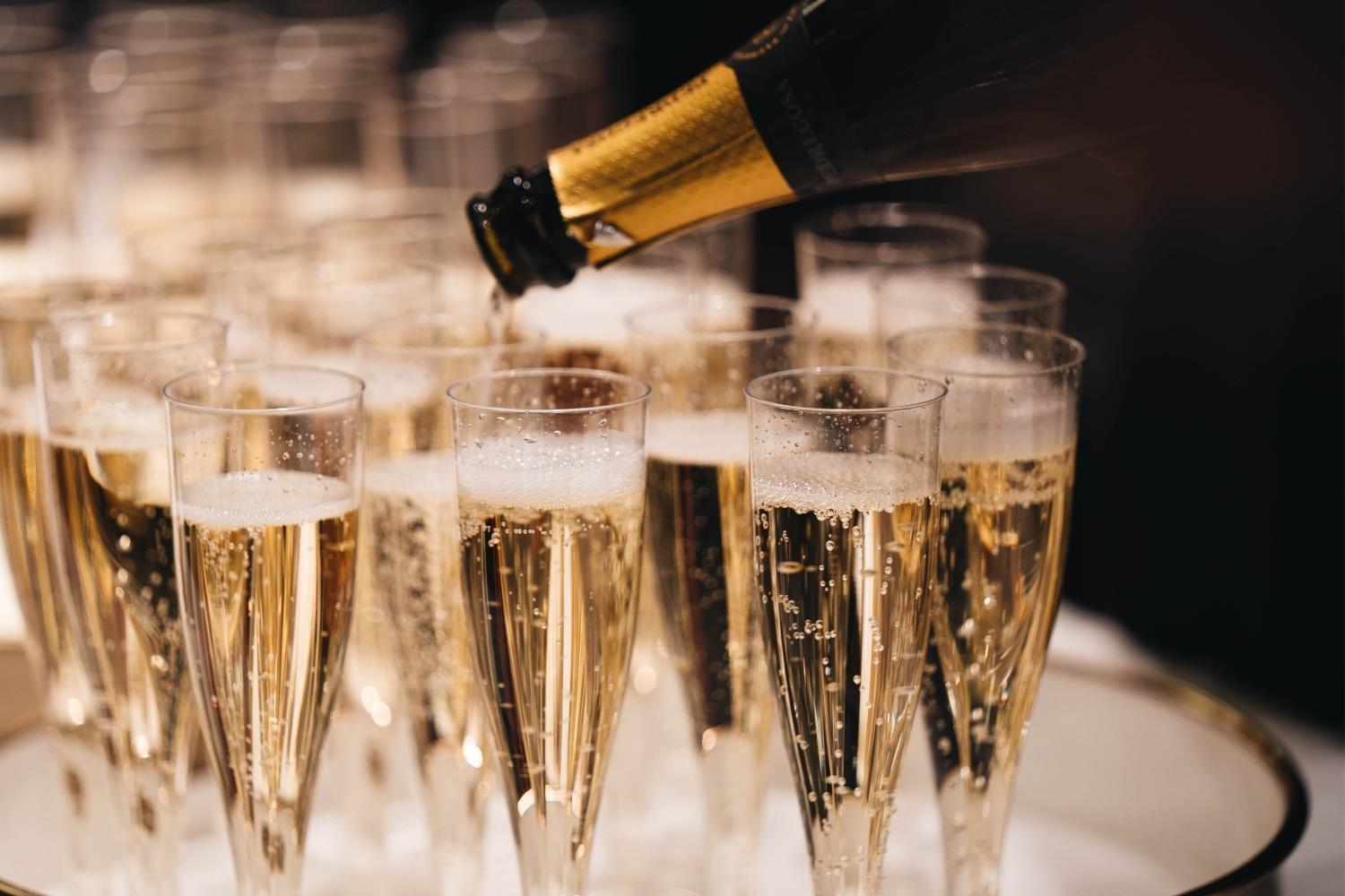 Champagne being poured into a glass