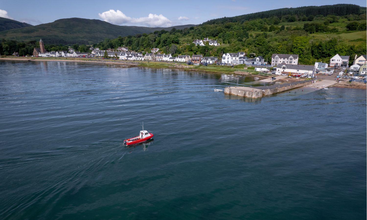 Aerial view of Lamlash on the Isle of Arran, showing the sheltered bay, waterfront and hills