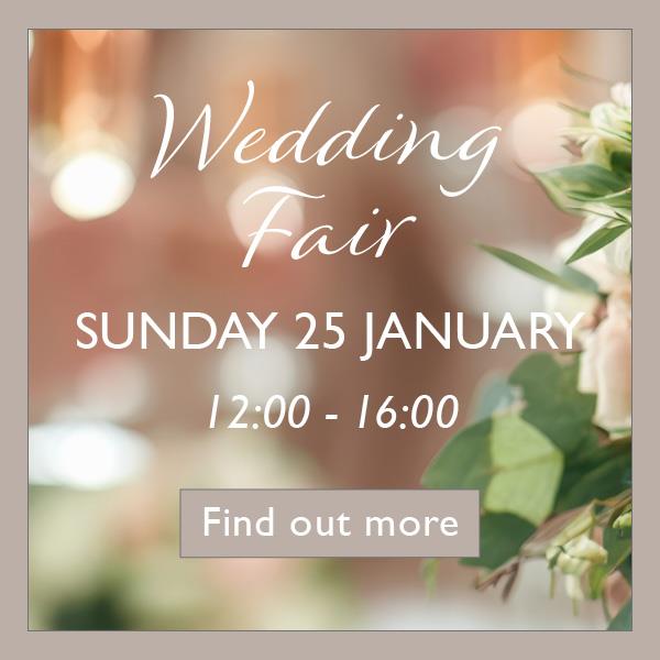 Blurred weddng flowers with text over