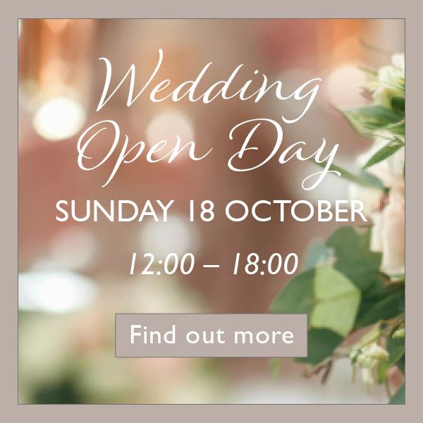 Blurred weddng flowers with text over