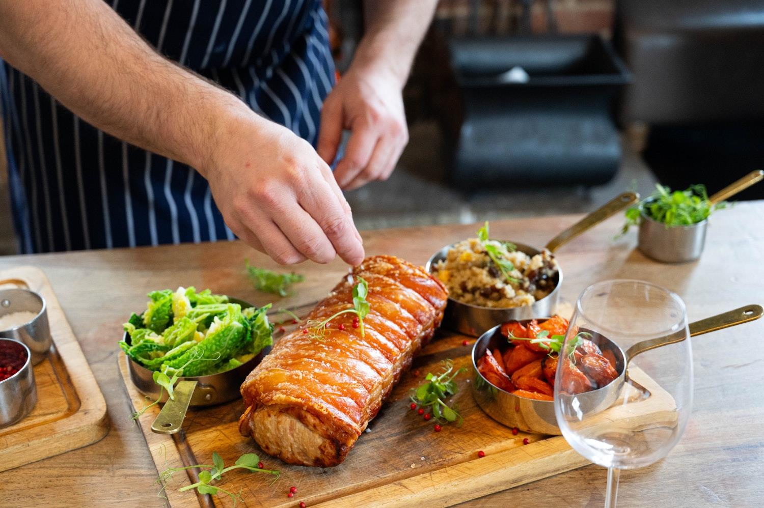 Roast Pork being served by the chef at Kinloch Hotel, Isle of Arran
