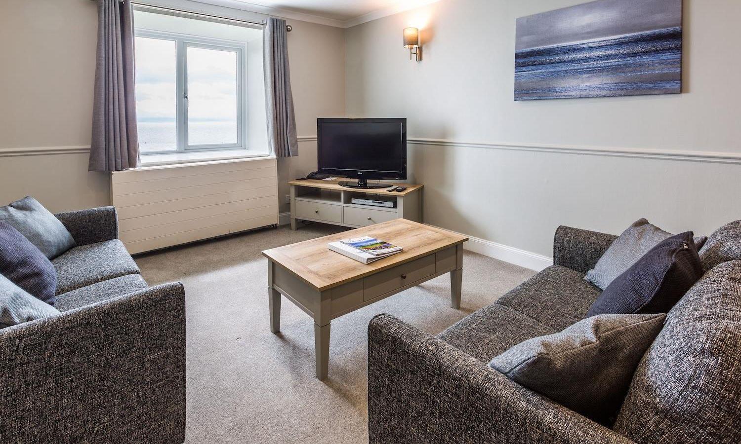Lounge with sea view in self-catering apartment