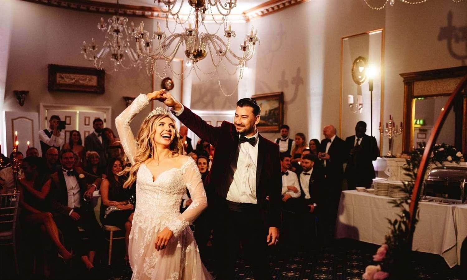 Wedding couple dancing at wedding reception