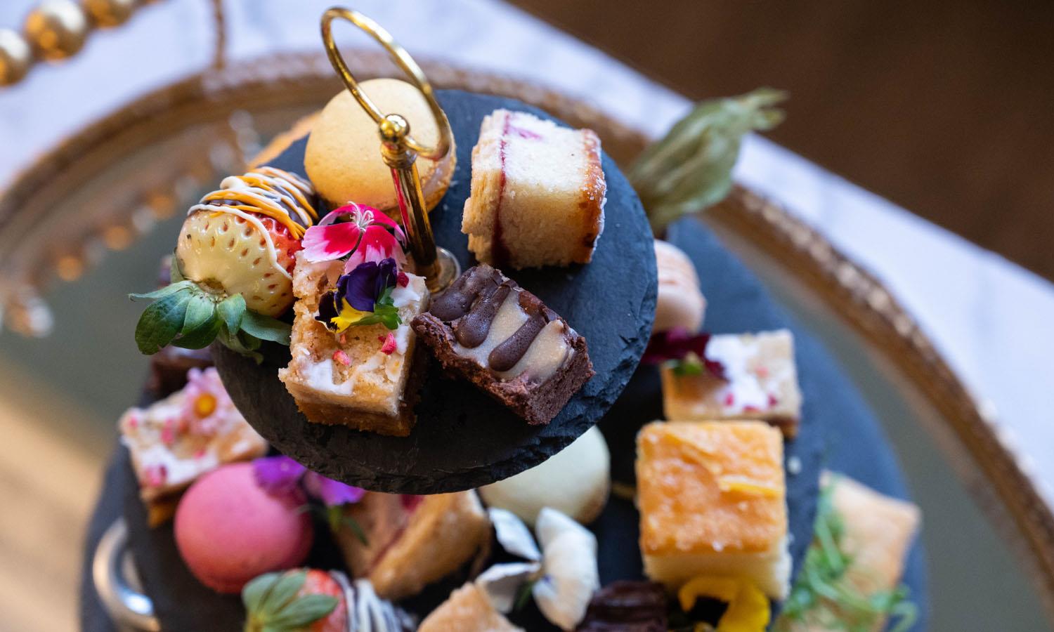 Lots of mini cakes on a stand
