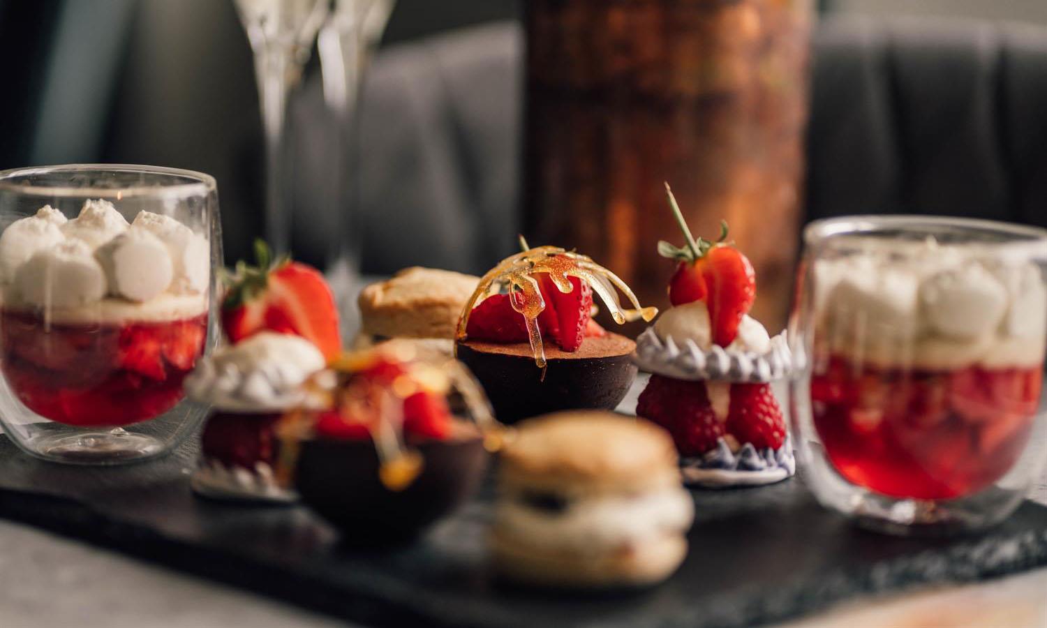 Champagne flutes next to Afternoon Tea at Kirkwall Hotel