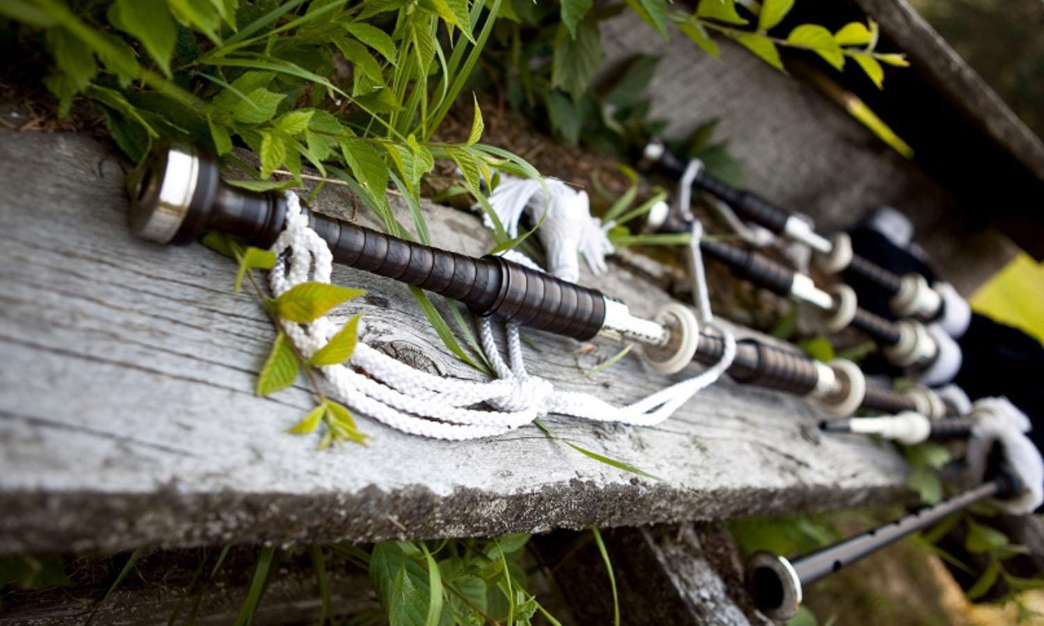 Bag pipes on a garden bench