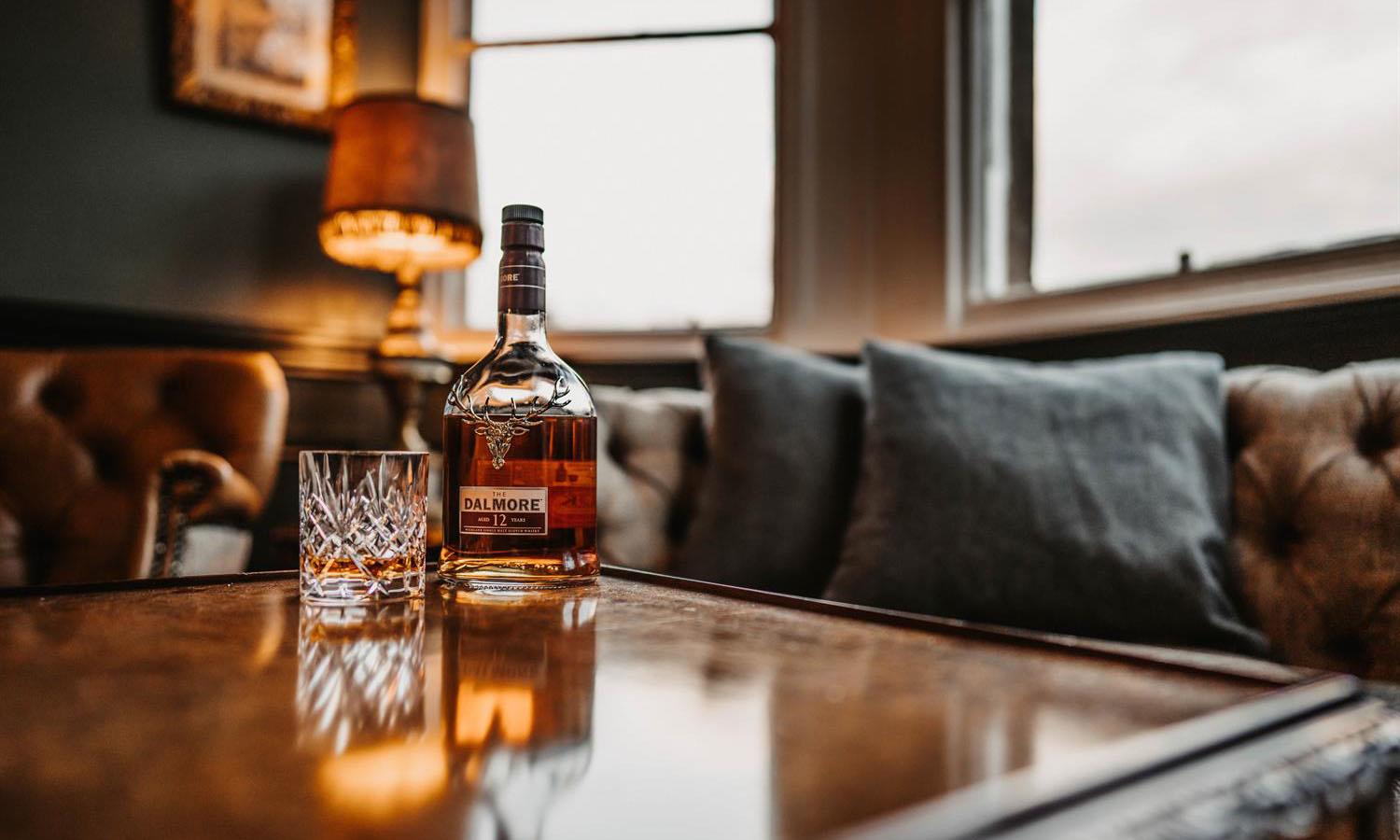 glass and bottle on table