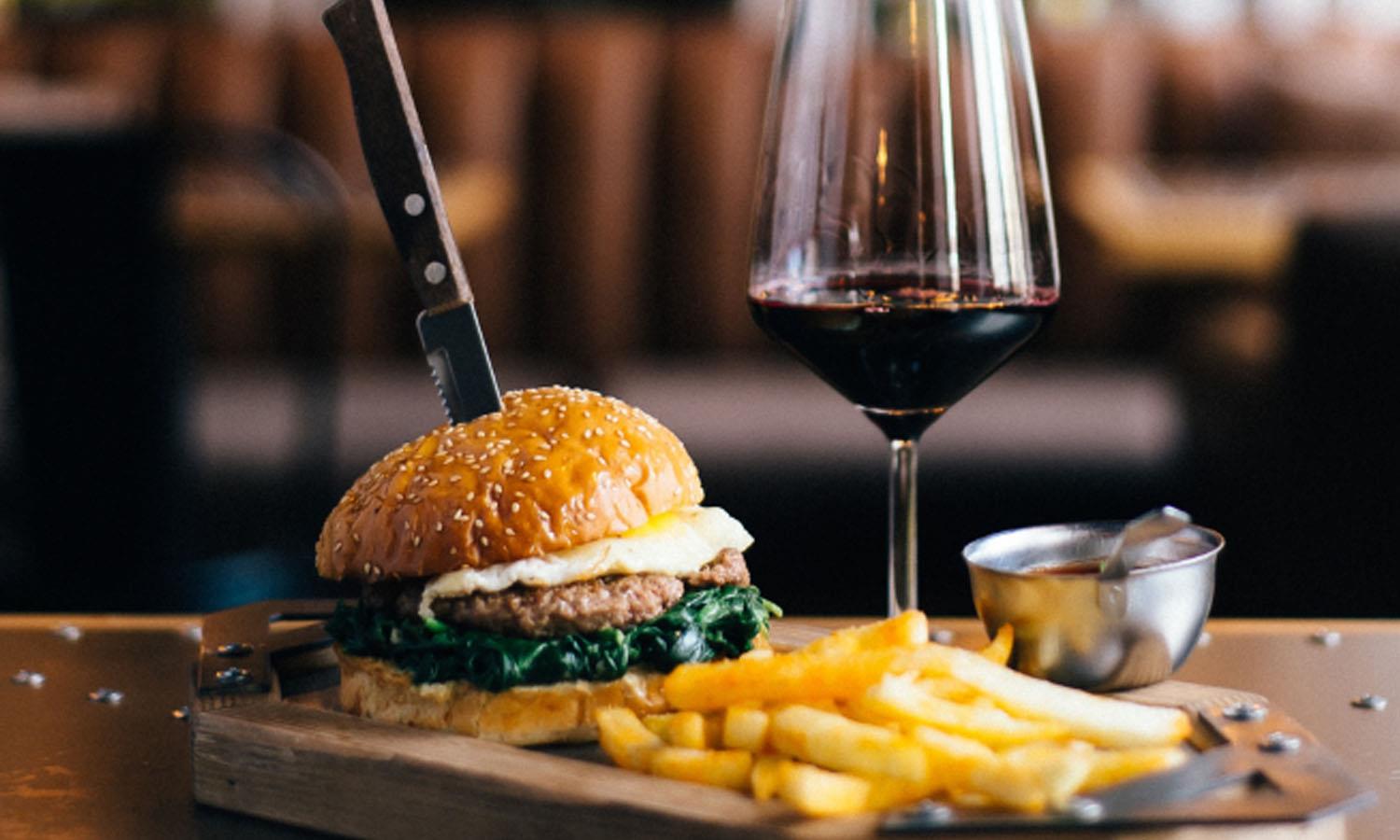 Broadford burger with glass of wine