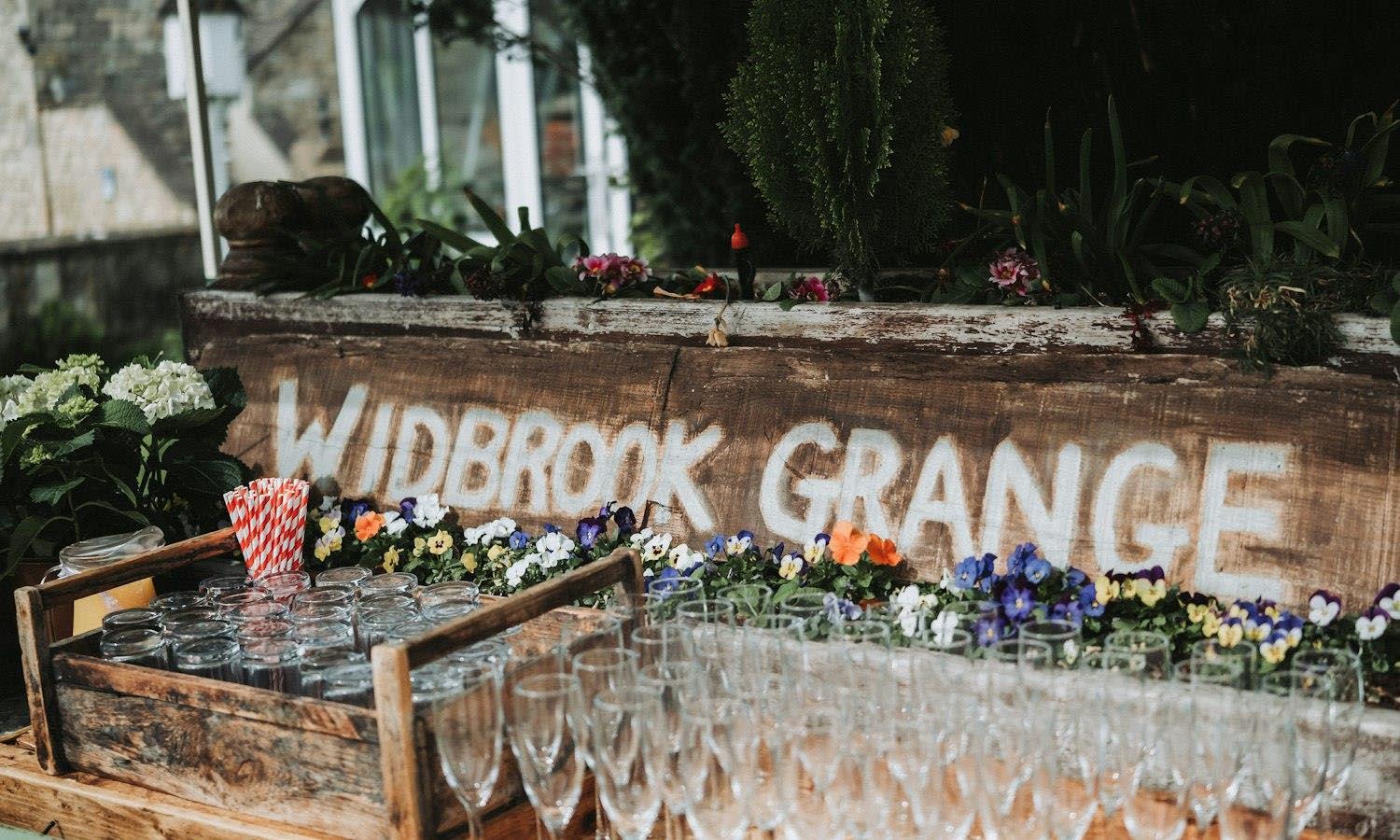 Widbrook Grange written on wooden bench