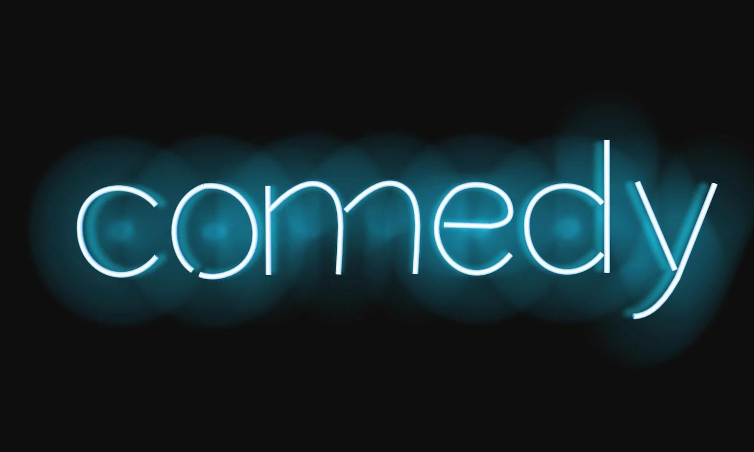 Neon comedy sign