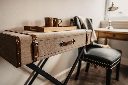 desk and chair in bedroom at Broadford Hotel 