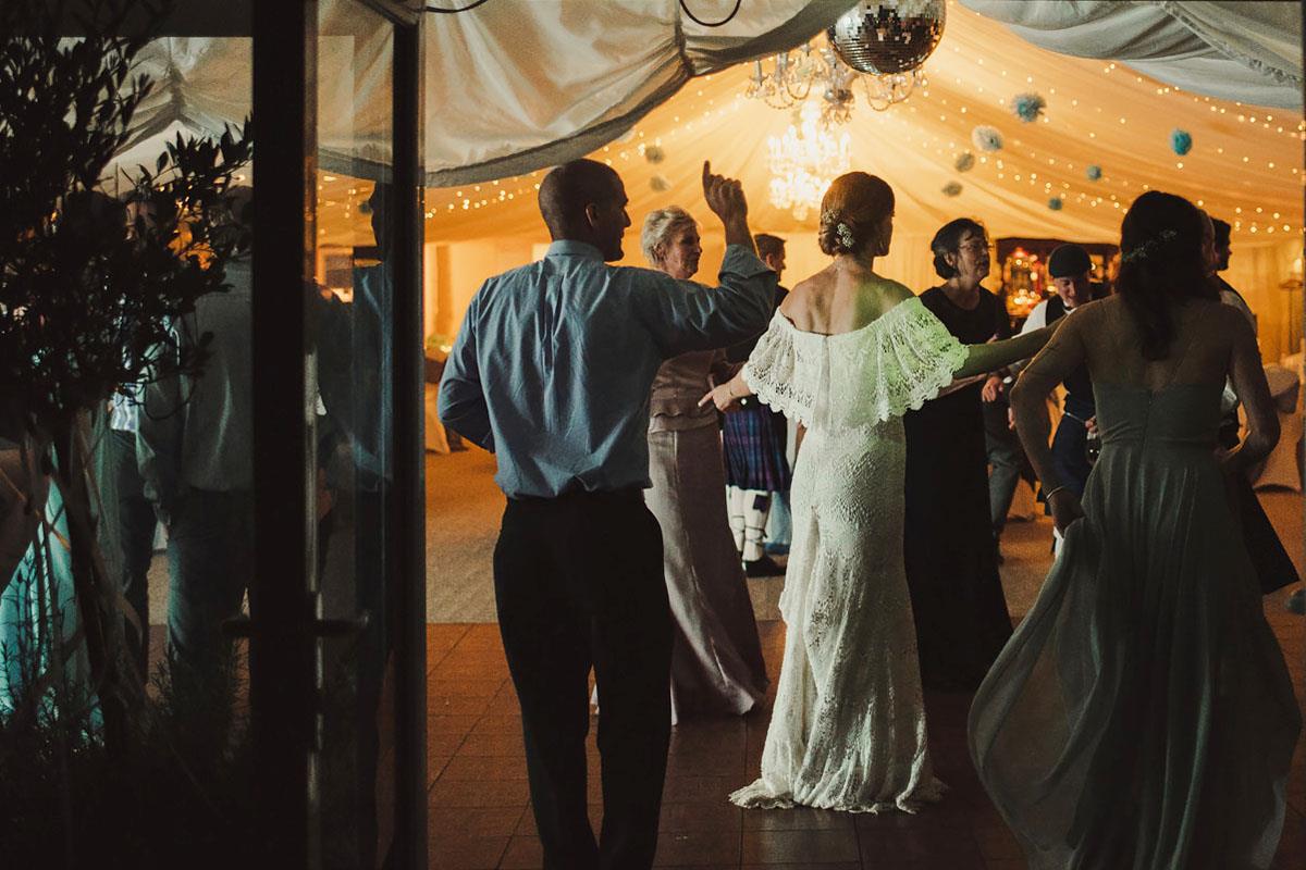 Wedding celebration with band in Melville Castle's marquee